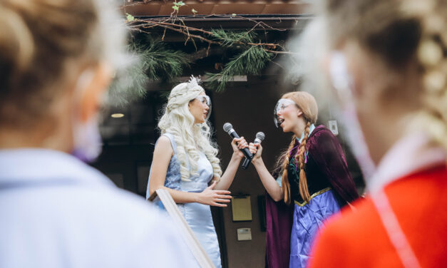 ‘Anna’ and ‘Elsa’ Perform at Flag Raising
